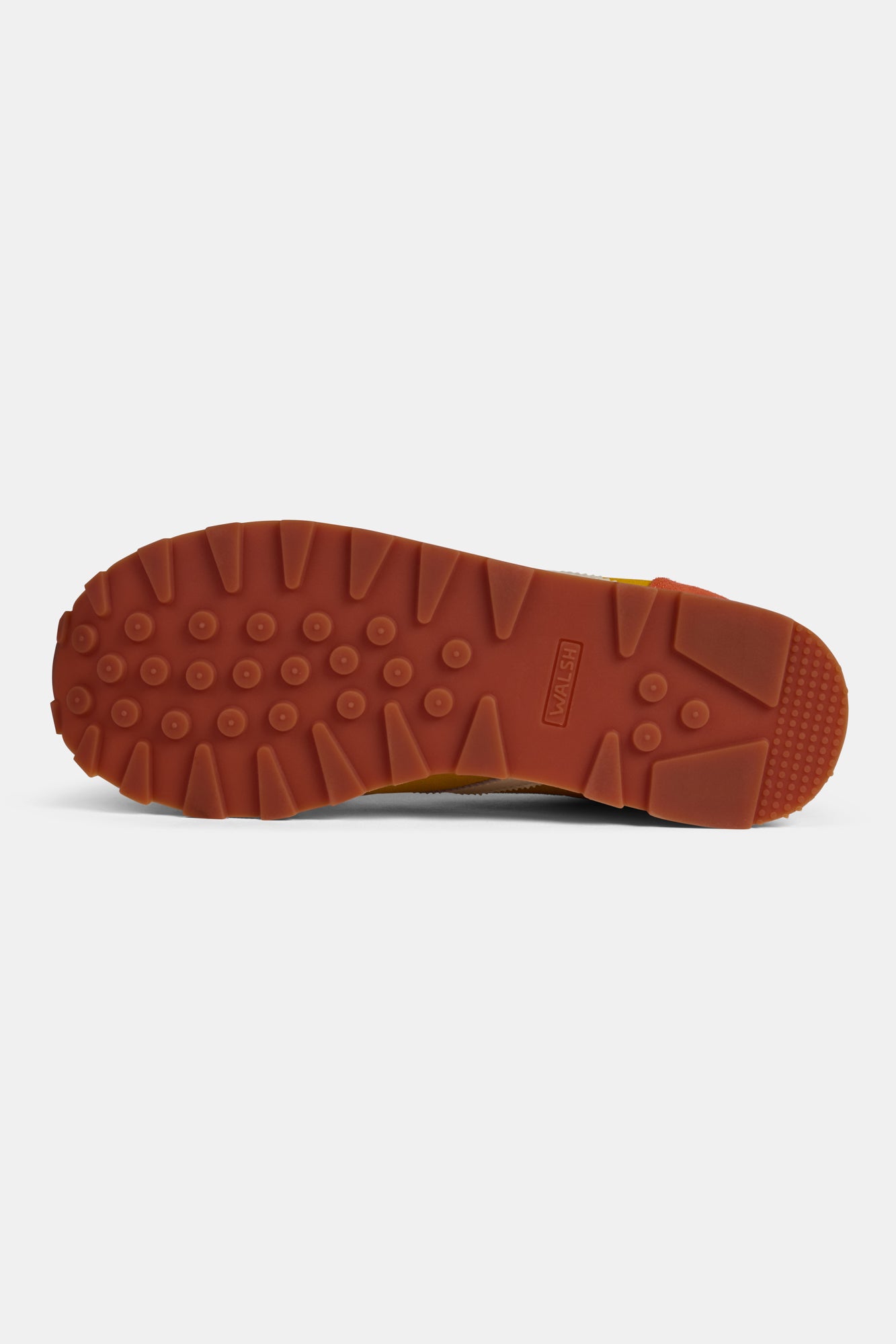 Brown sole of a shoe on a white background