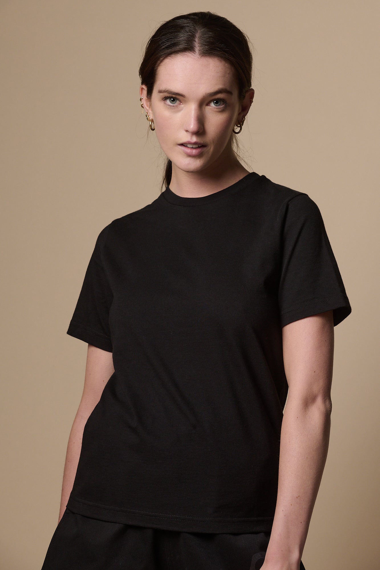 female wearing shot sleeve t shirt plastic free in black