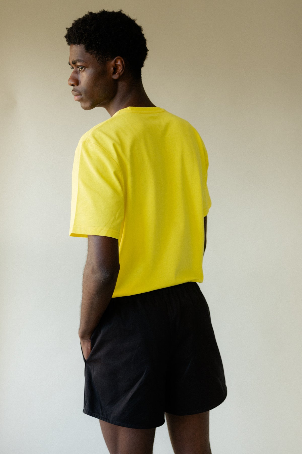 
            Image showing back of black male wearing heavyweight sports short plastic free in black