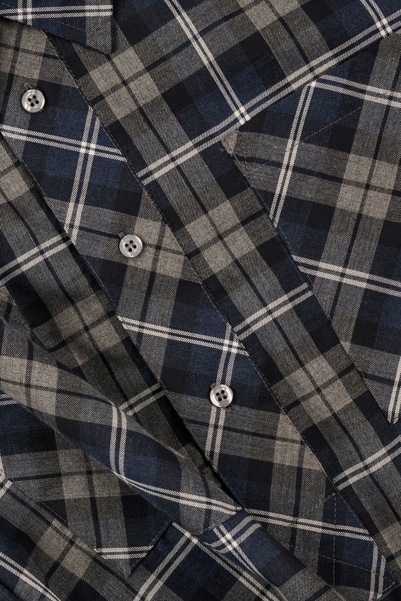 Close up of blue mixed check shirt