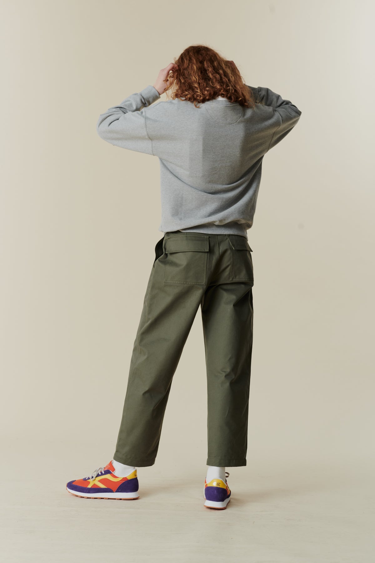 back of female wearing olive combat trouser