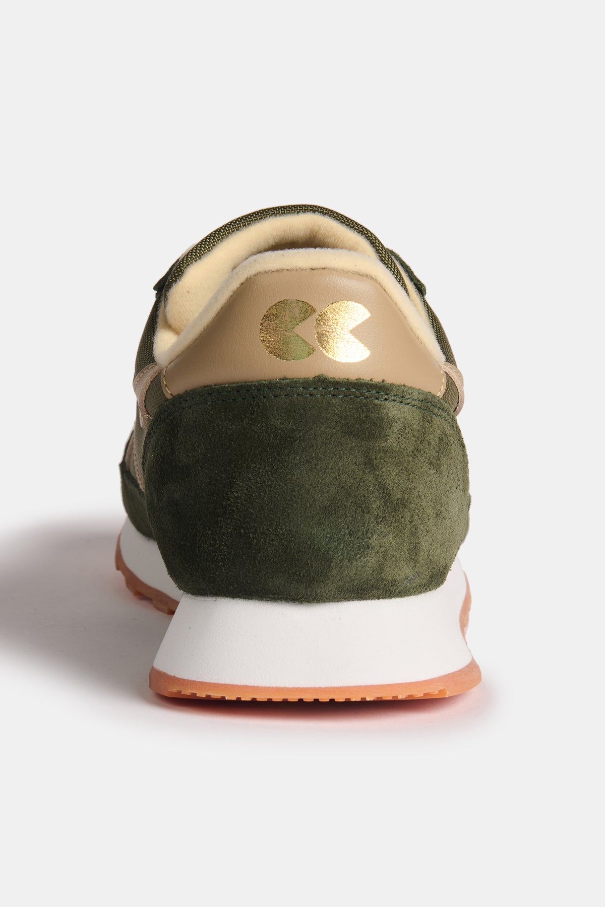 
            The heal of Community Clothing X Walsh Beacon trainer in dark olive and beige