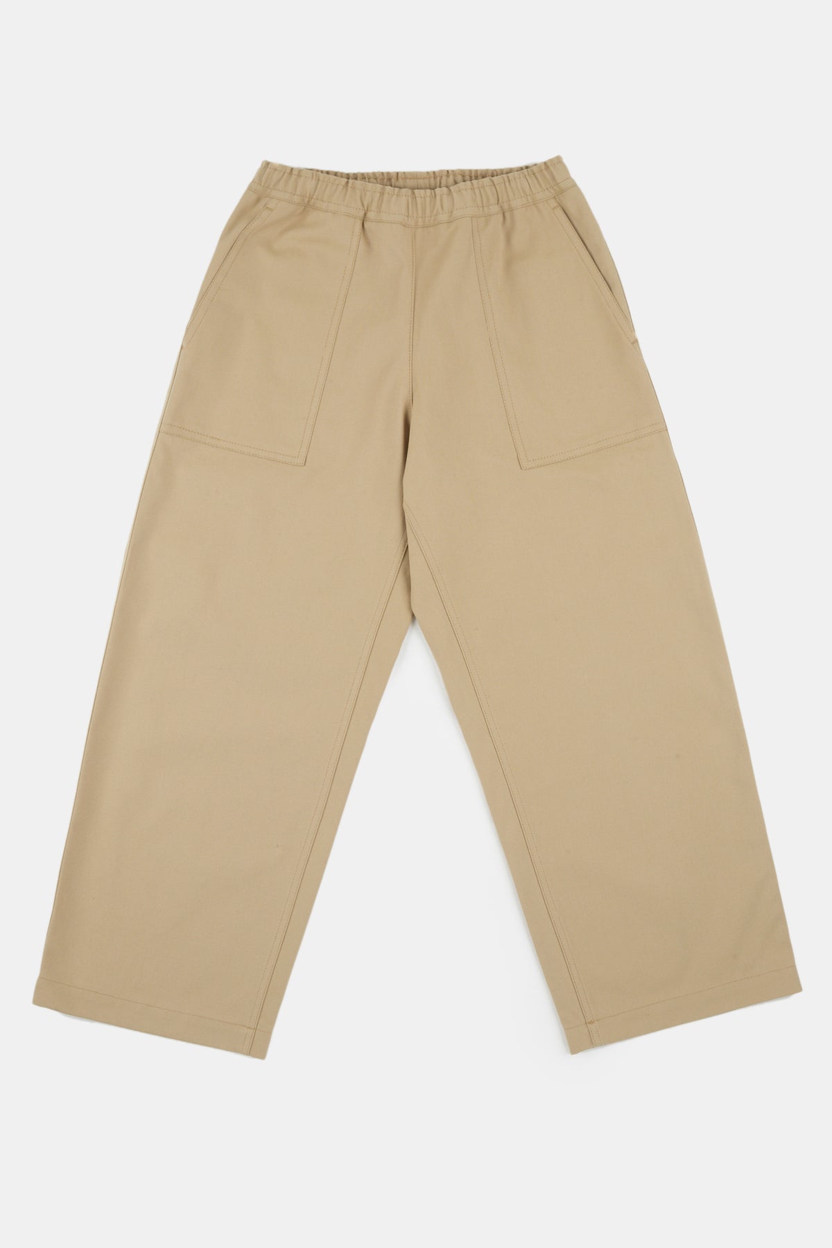 
            Flatlay image of camerawoman drawstring tapered cotton canvas trousers in putty 