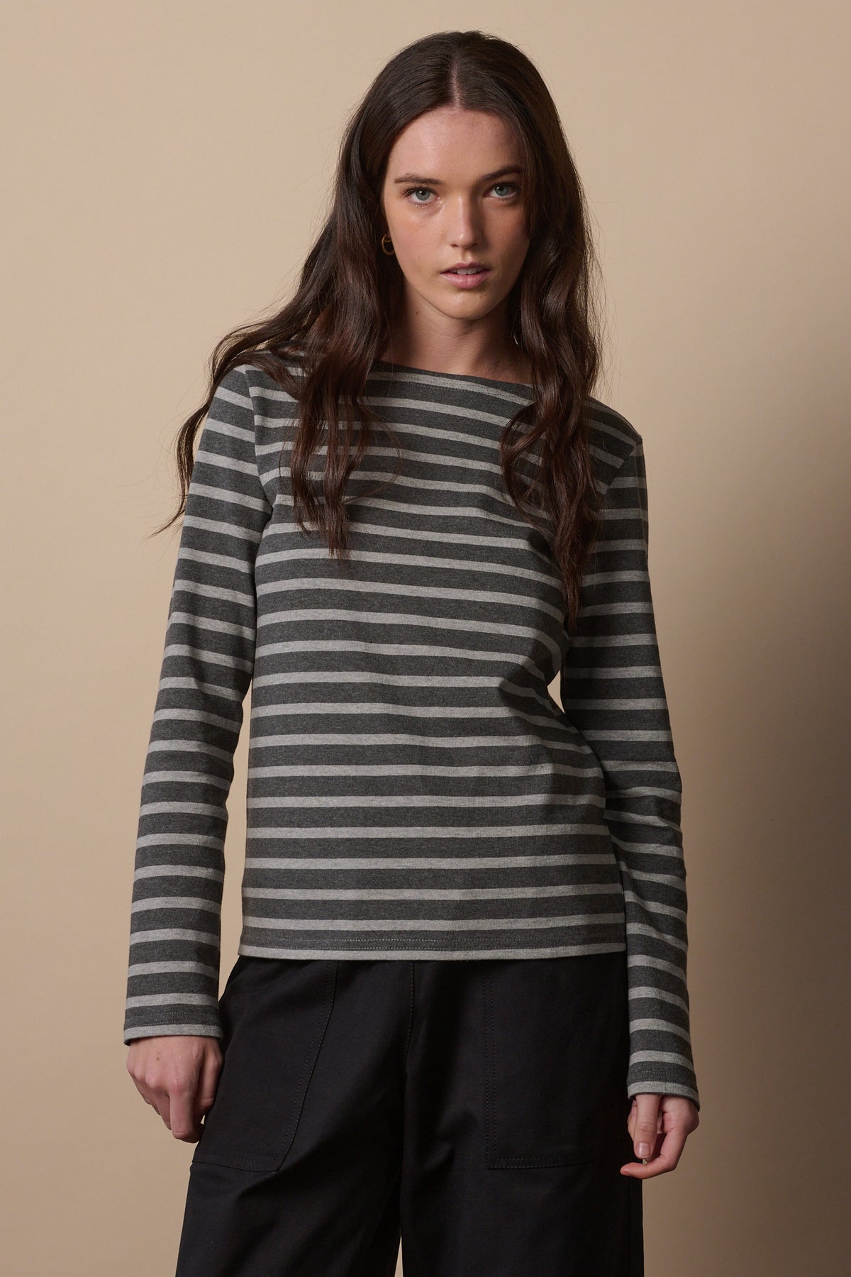White female with long brunette hair wearing Breton in charcoal marl and grey marl