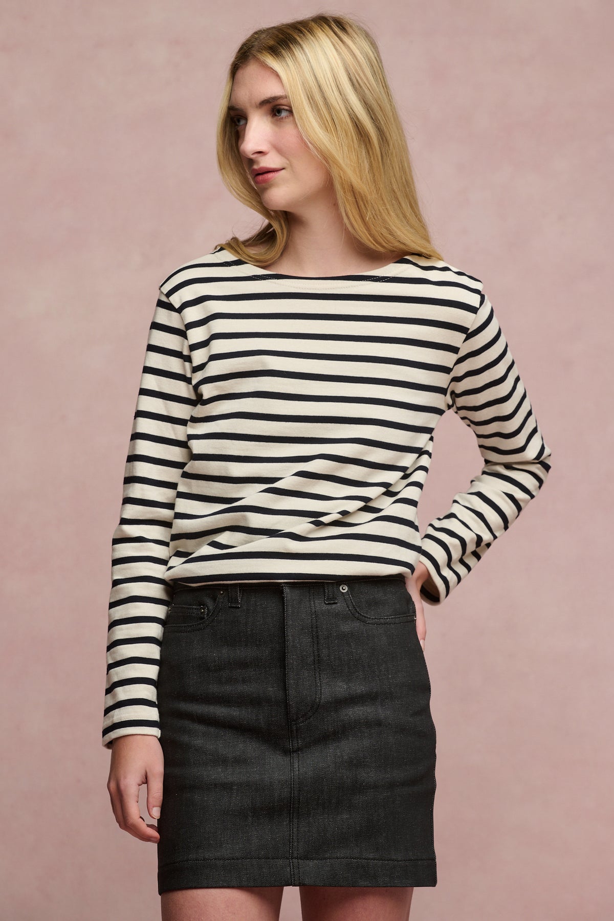 
            Thigh up image of blonde female wearing Charlie denim mini skirt in black paired with Breton in white black