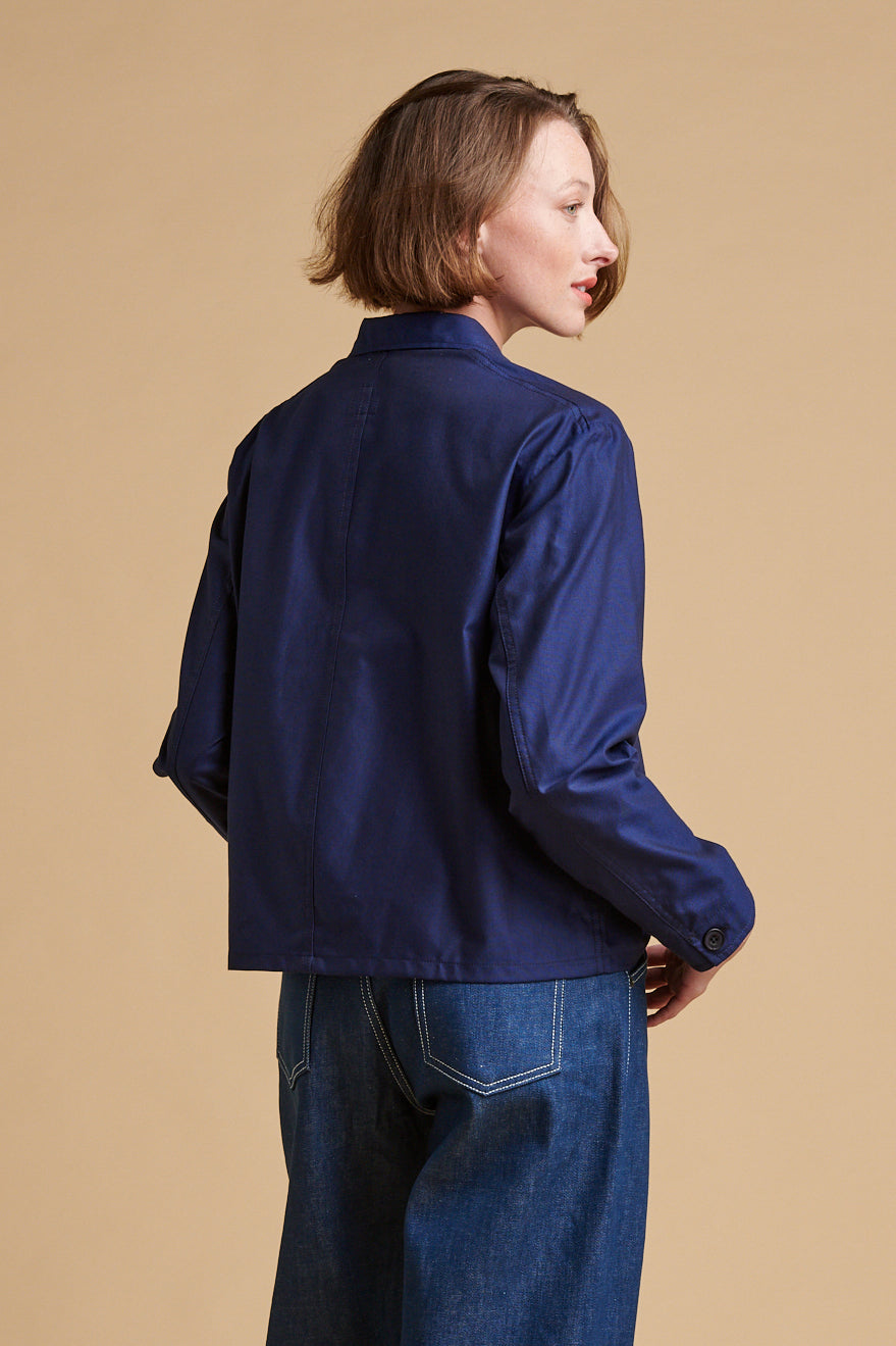 The back of female wearing Elena shirt in navy.