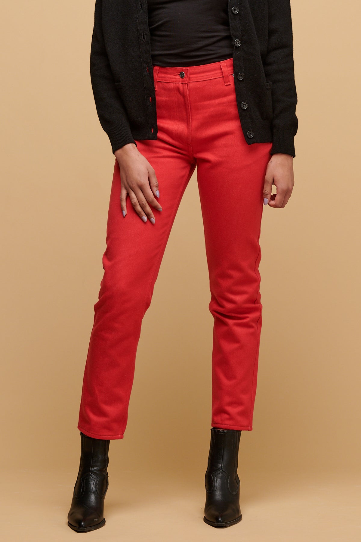 
            Chest down of female wearing Gloria jean in poppy paired with black boot