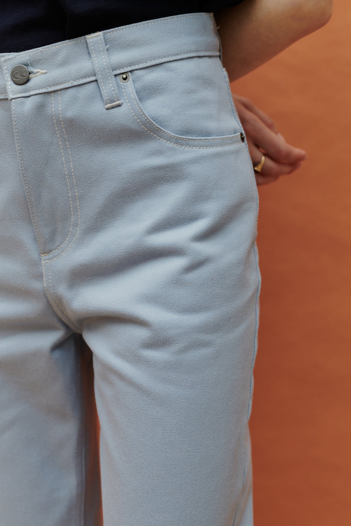 
            close up of the front of gloria tapered jean in light blue