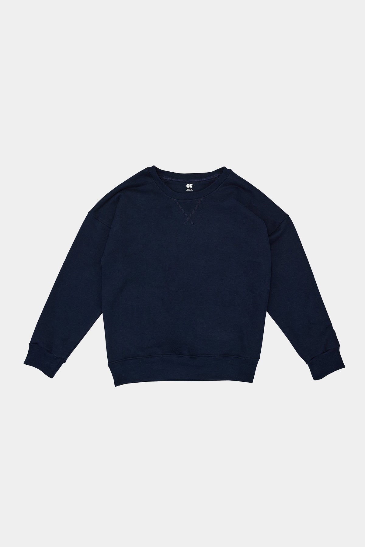 Navy blue sweatshirt on a light gray background