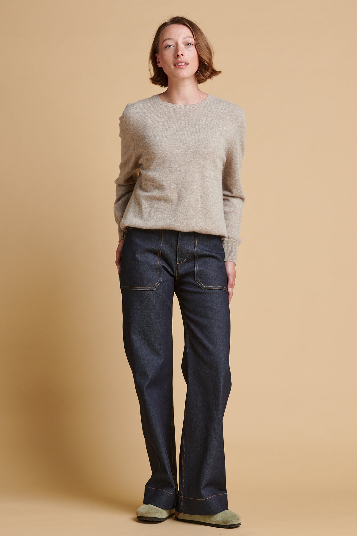 Woman wearing indigo jeans.