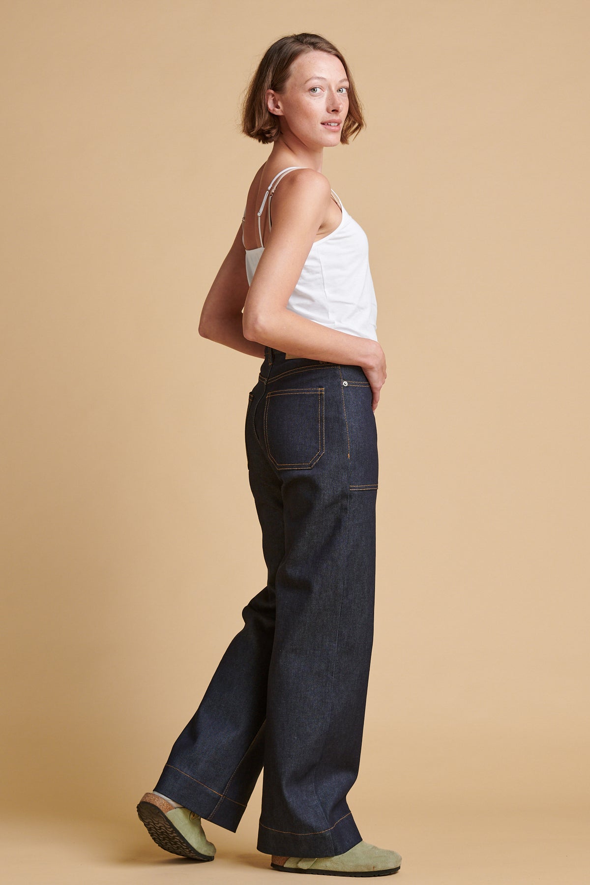 The back of female wearing high rise wide leg Linda jean.