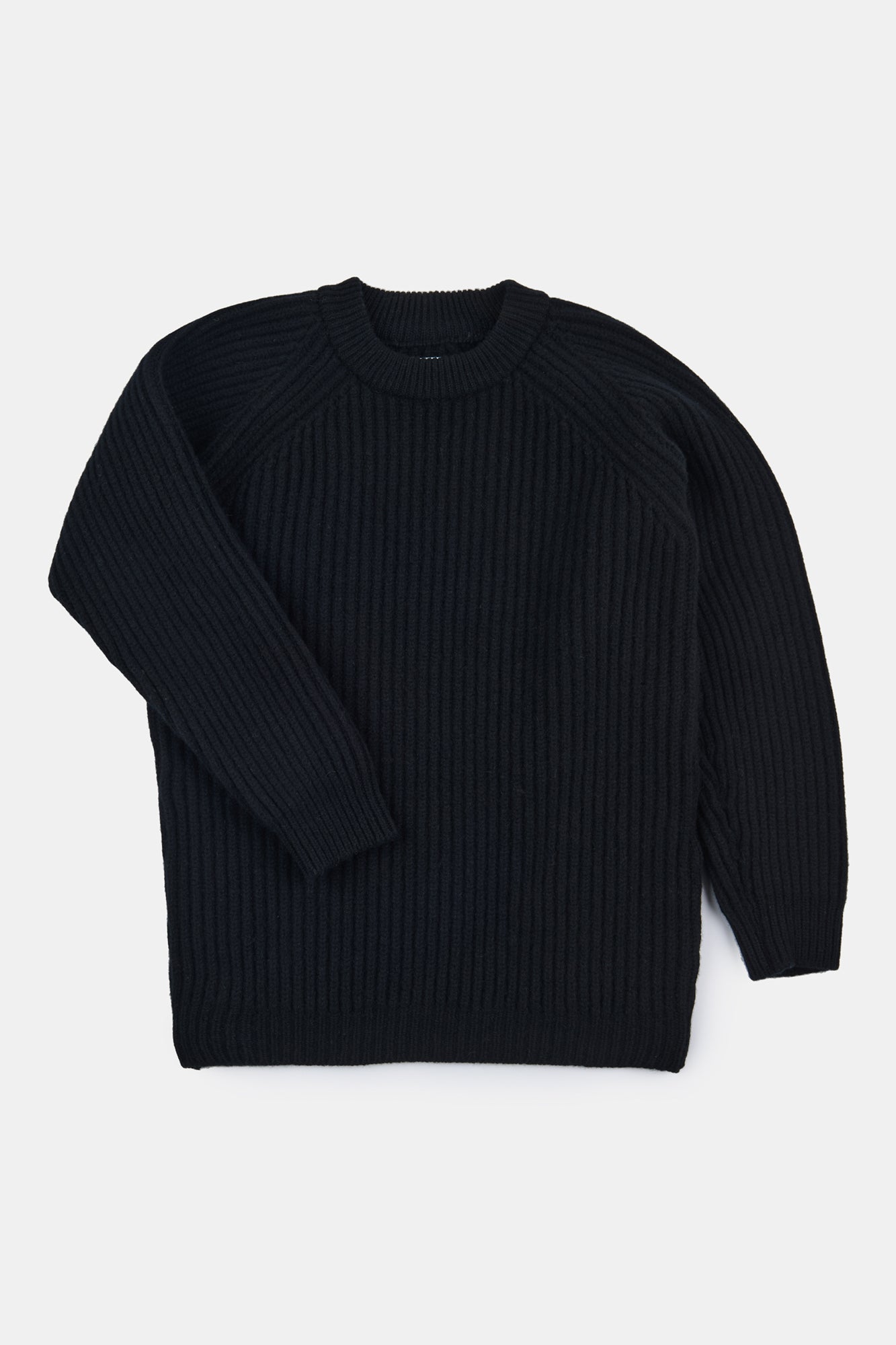 Women's lambswool fisherman ribbed jumper in black flatlay shot