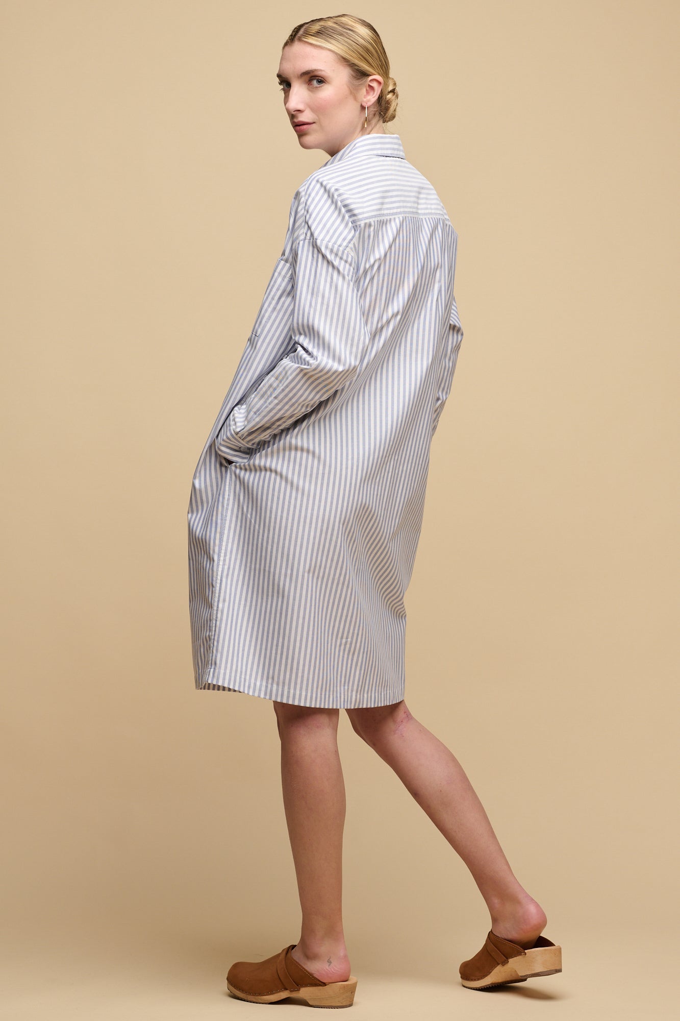 full body image of the back of female wearing Lorelle shirt dress without the belt 