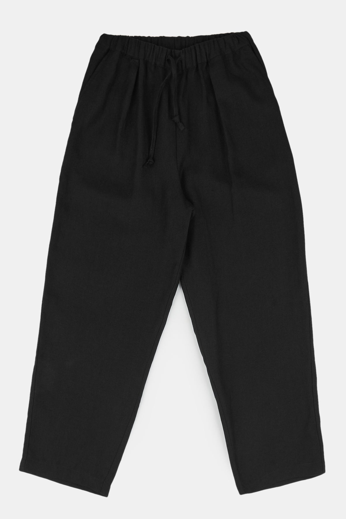 Flatlay product shot of women's elasticated waist trousers in black