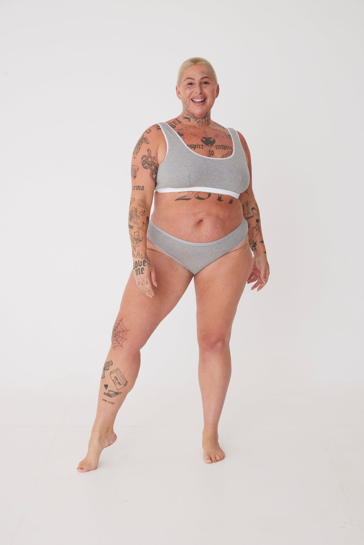 plus size, white female wearing grey low rise brief paired with soft jersey bra