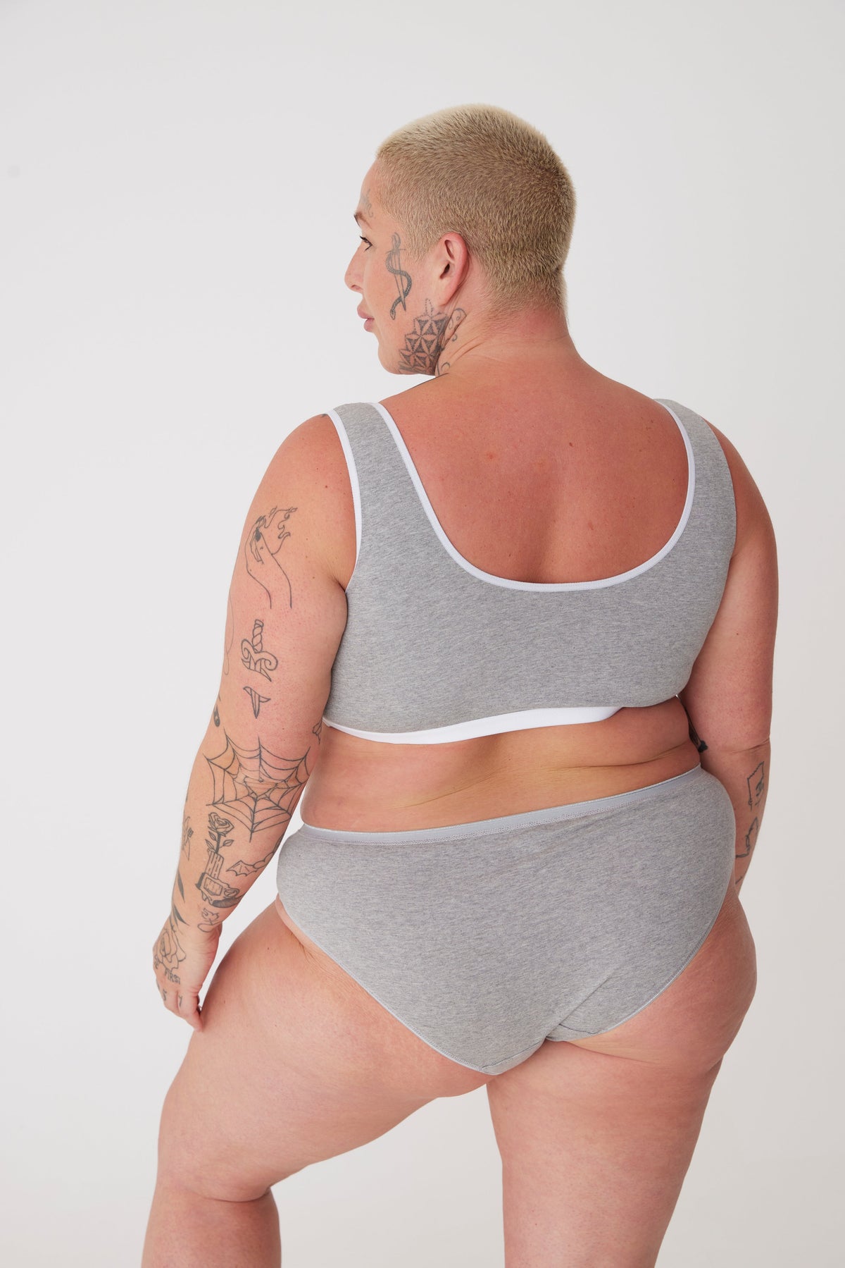 plus size, white female wearing grey low rise brief