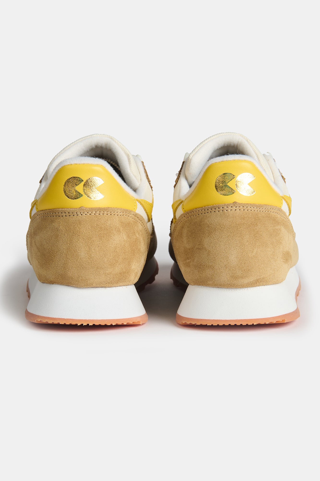 The heel of Walsh X CC Parlick trainers in Ivory/Tan/Daffodil with CC logo on the heel