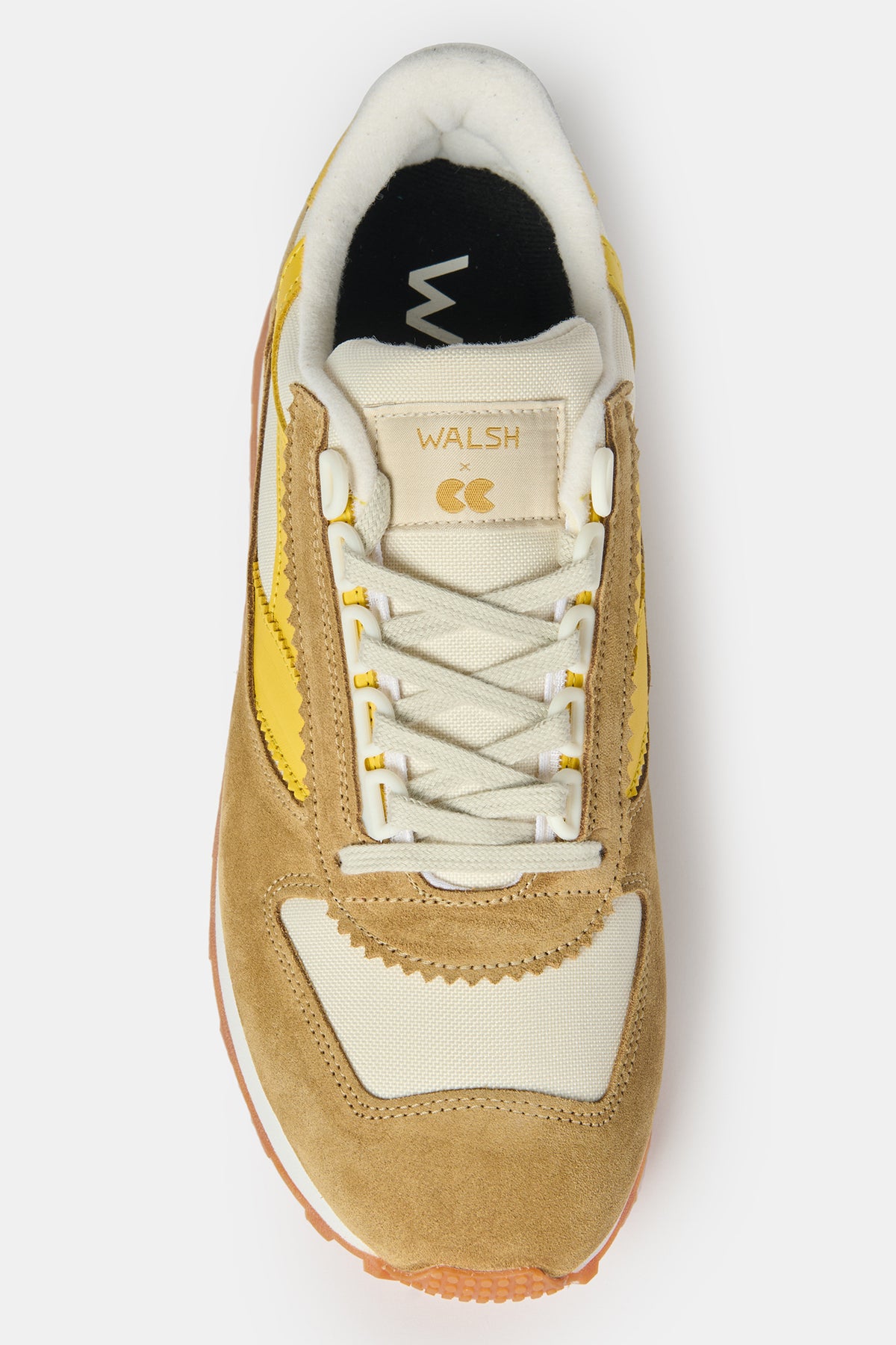 the Top view of Walsh X CC Parlick trainers in Ivory/Tan/Yellow, white laces and WALSH X CC embroidered badge on the tongue