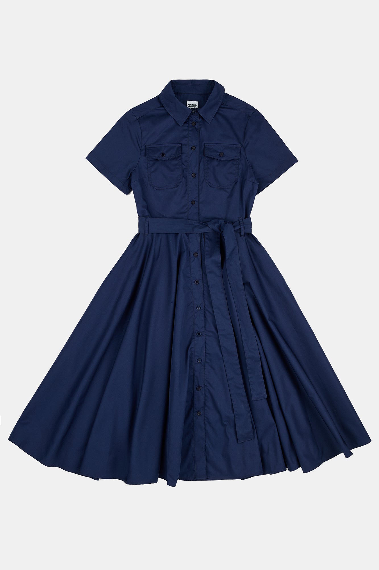 Flatlay product image of full skirted Phoebe trench dress in navy