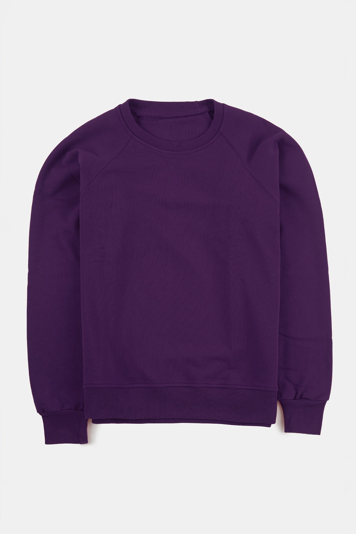 Women's raglan sweatshirt in purple flatlay