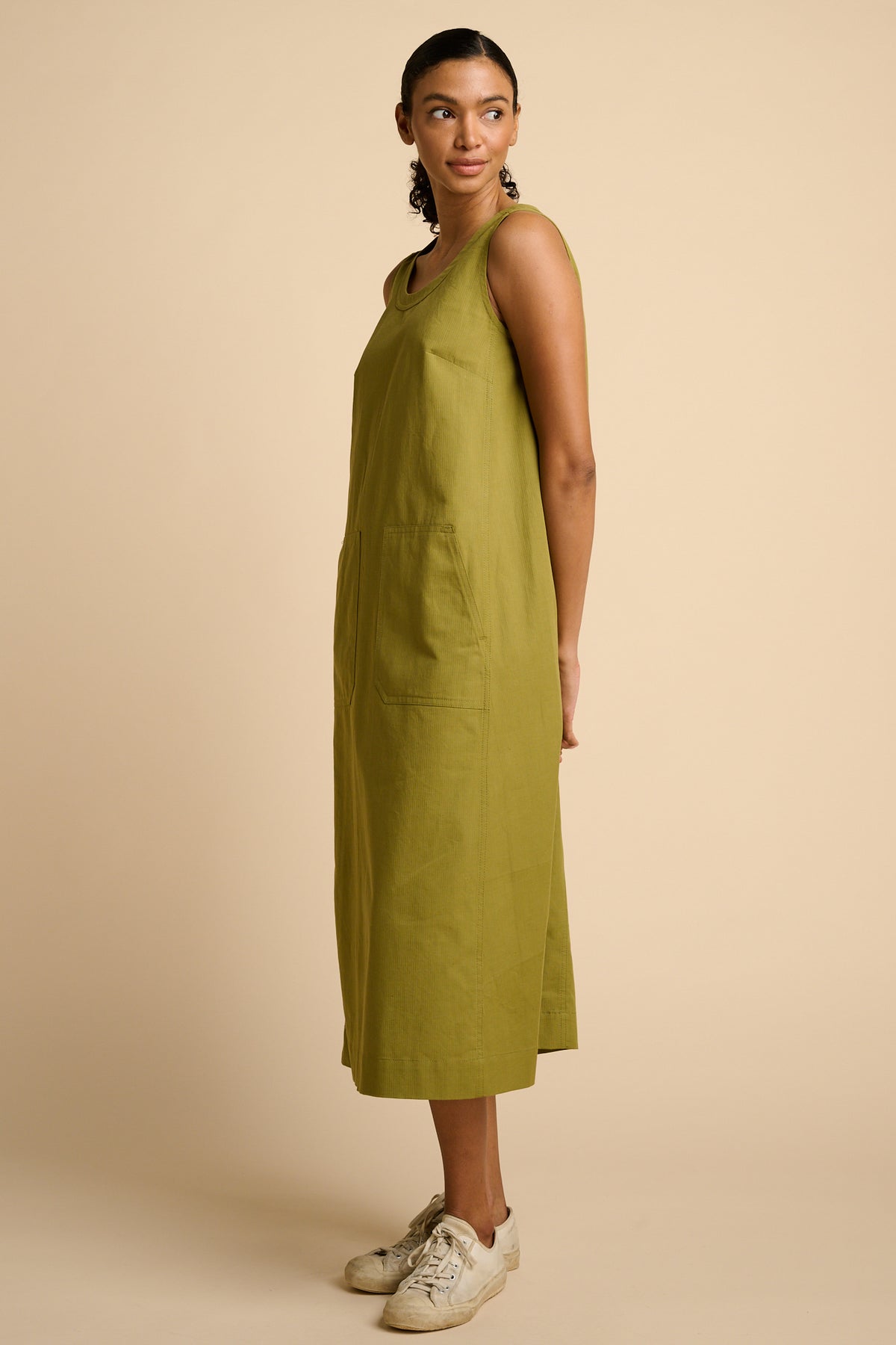 Woman in green maxi dress.