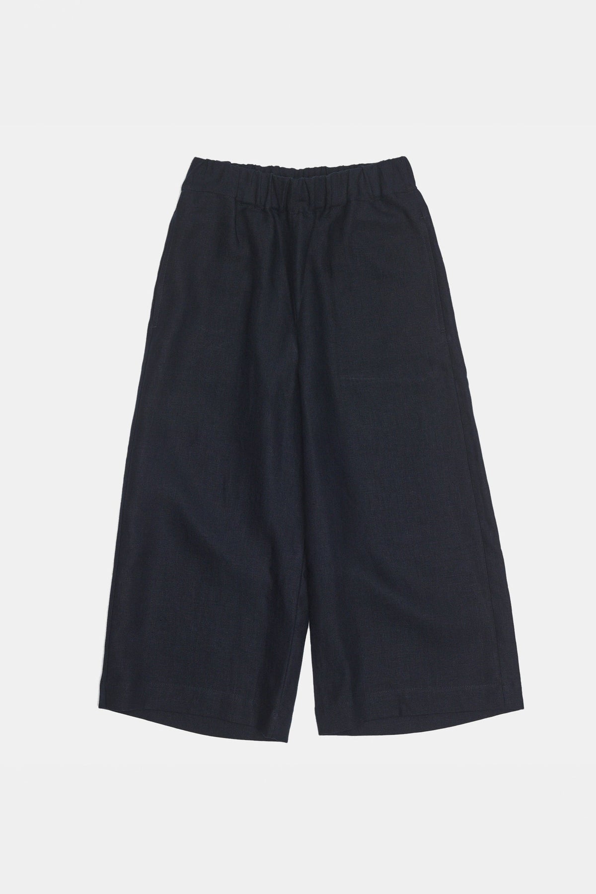 Overhead flat lay shot of short pj trousers in navy linen