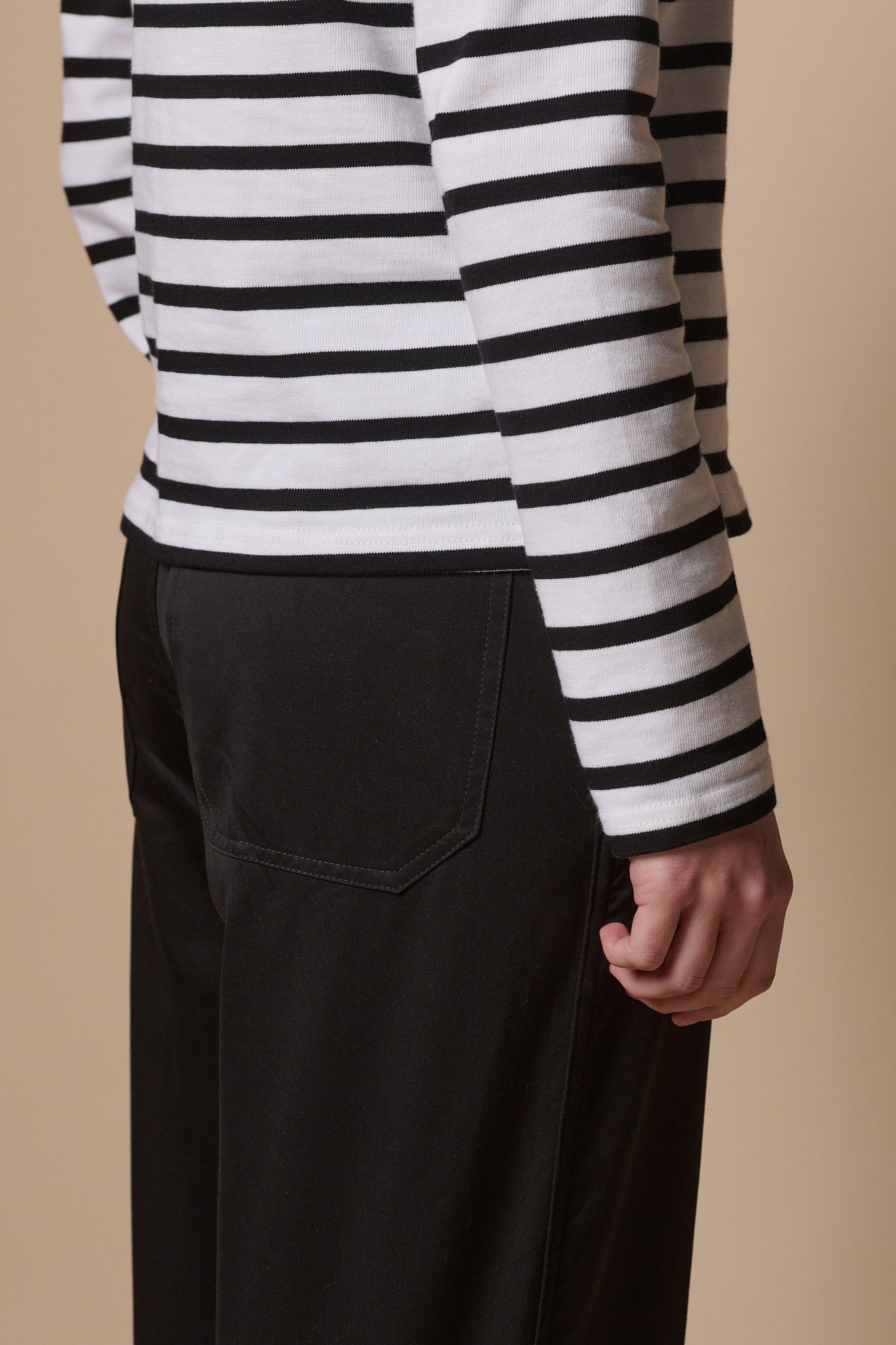 Back pocket of work trousers in black