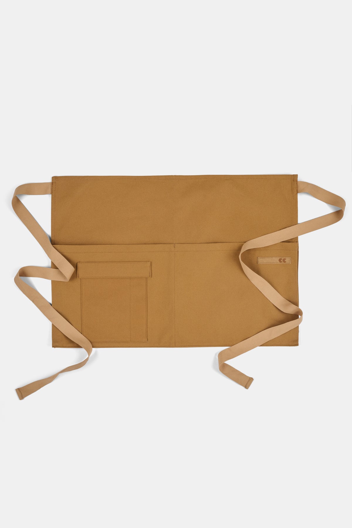 Tan apron on a white background