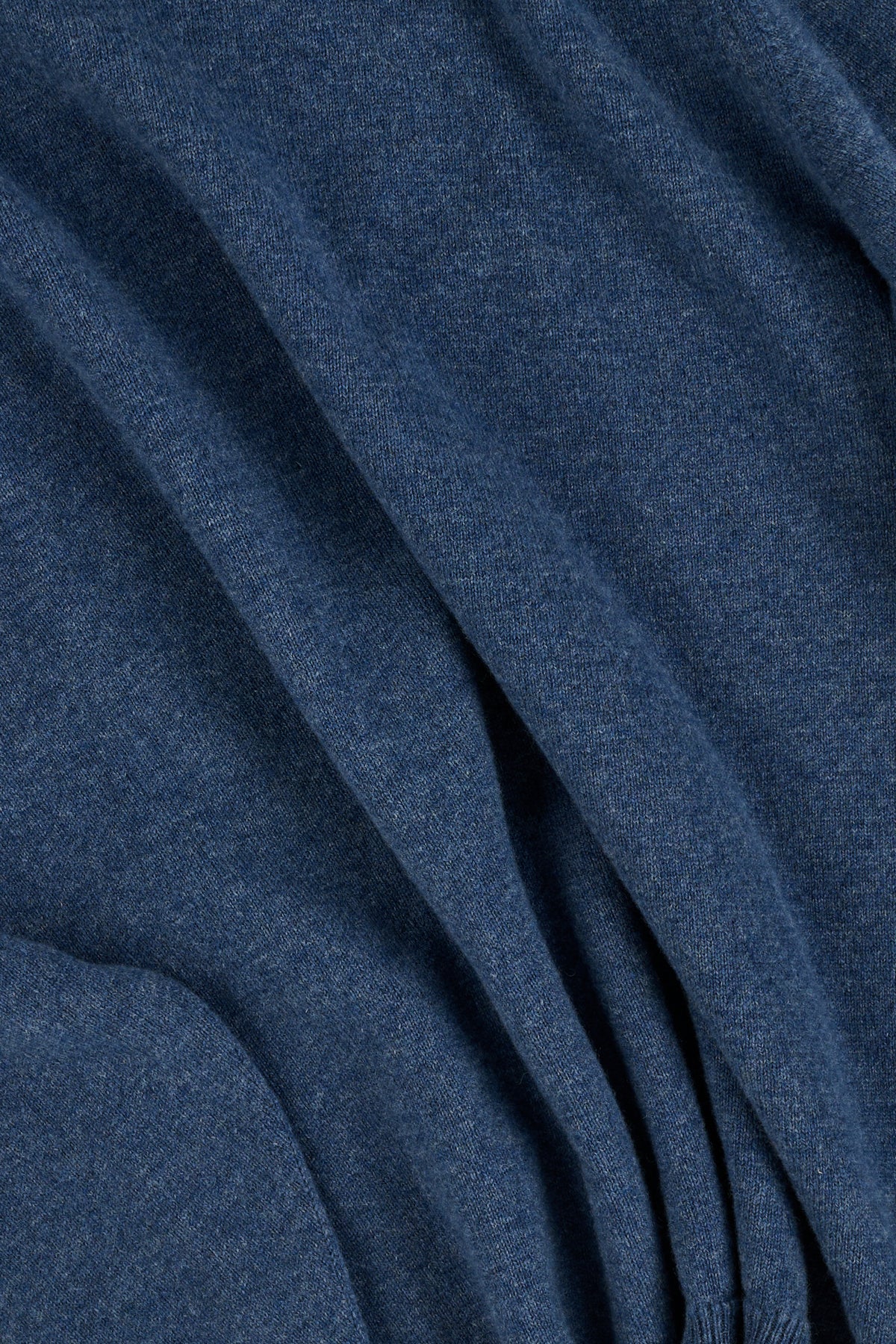 Close up of blue marl lambswool knitted sweater.