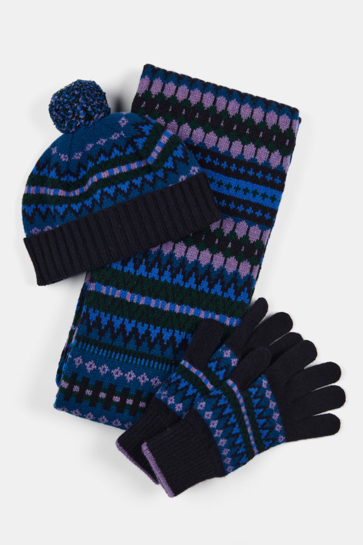 
            Fair Isle Hat, scarf and glove set in blue with navy blue, dark green and purple details