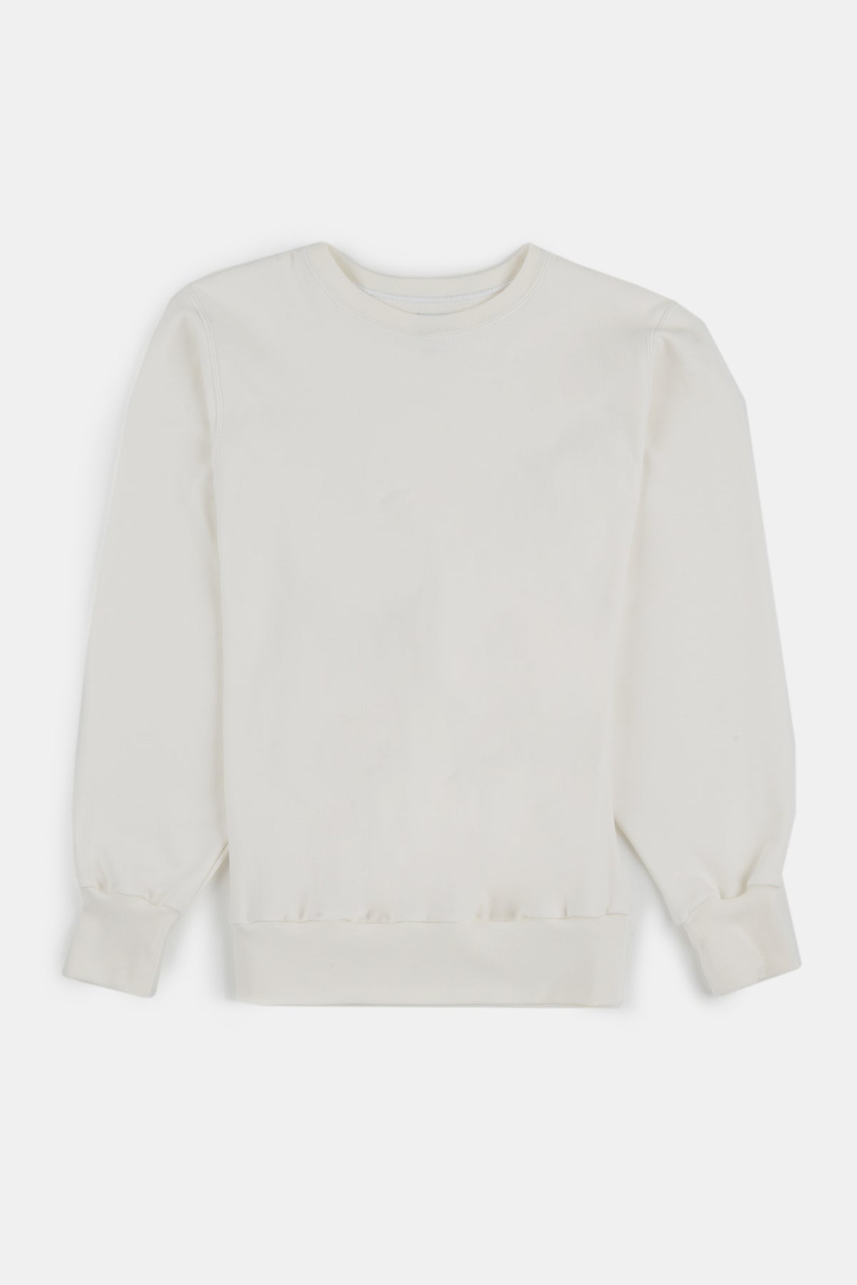 Flatlay image of men's 80s sweatshirt in bone