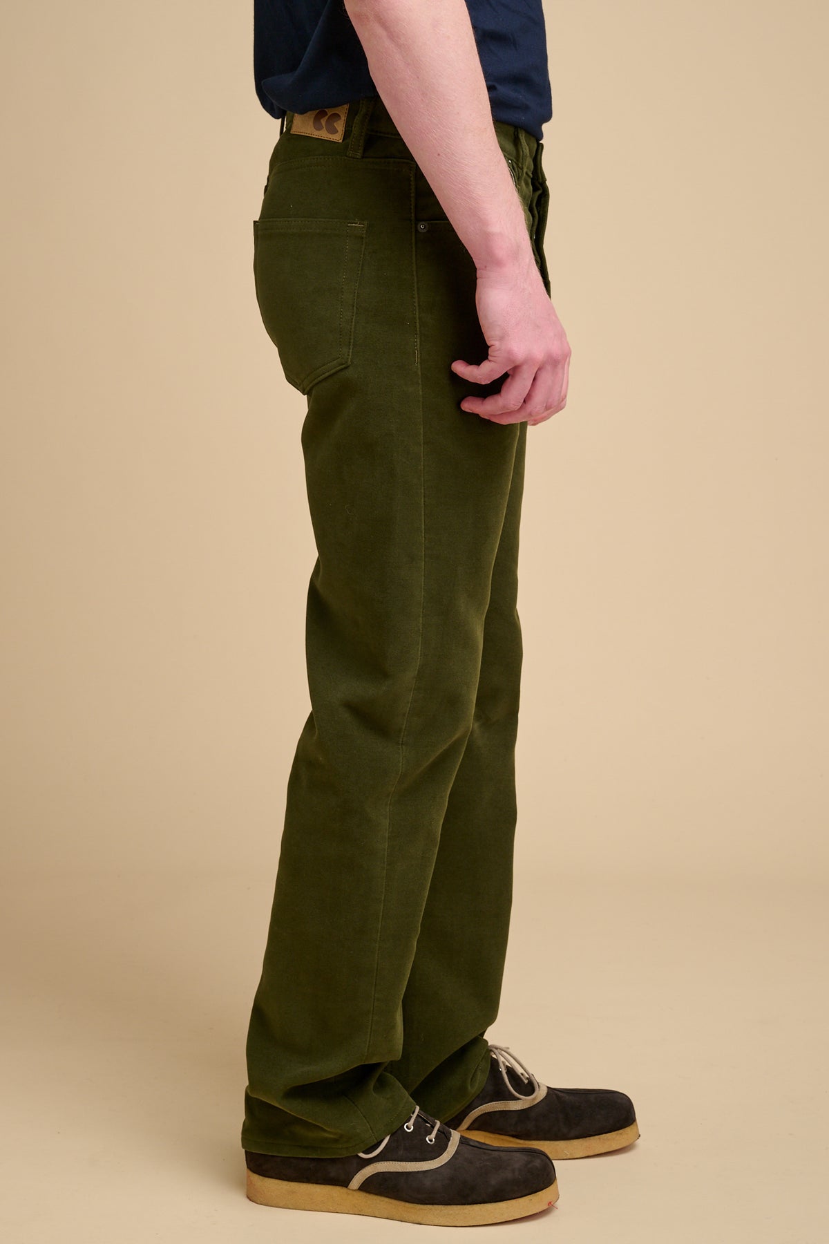 Male dark olive wearing moleskin jeans.