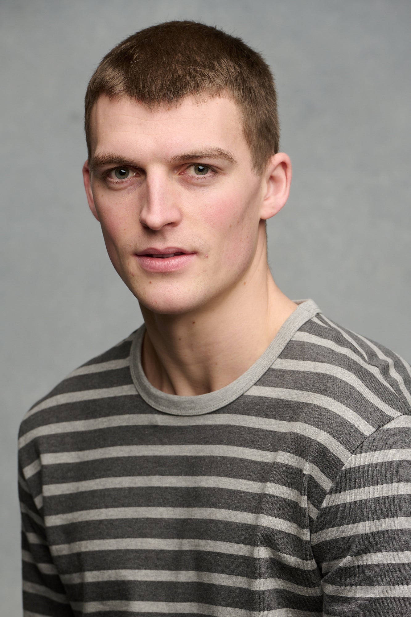Portrait of male wearing Breton in charcoal marl and grey marl