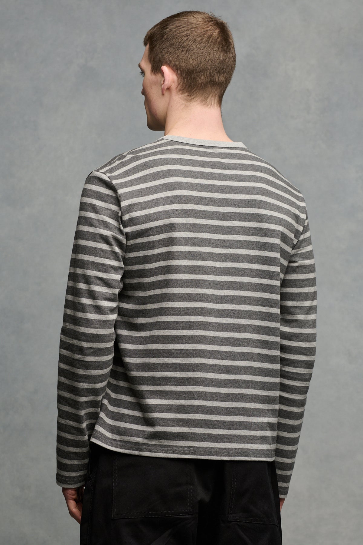 
            thigh up of the back of male wearing charcoal/grey Breton