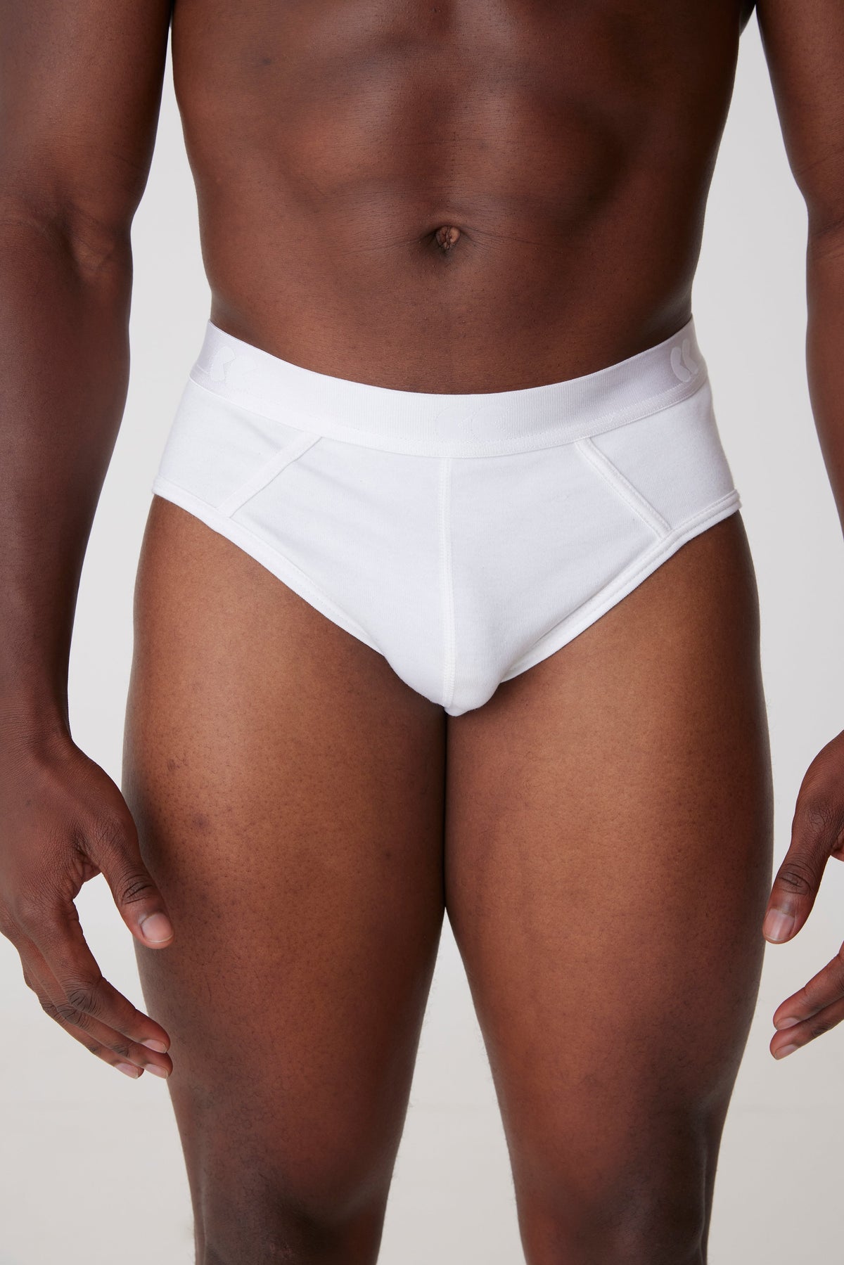 black male in white brief