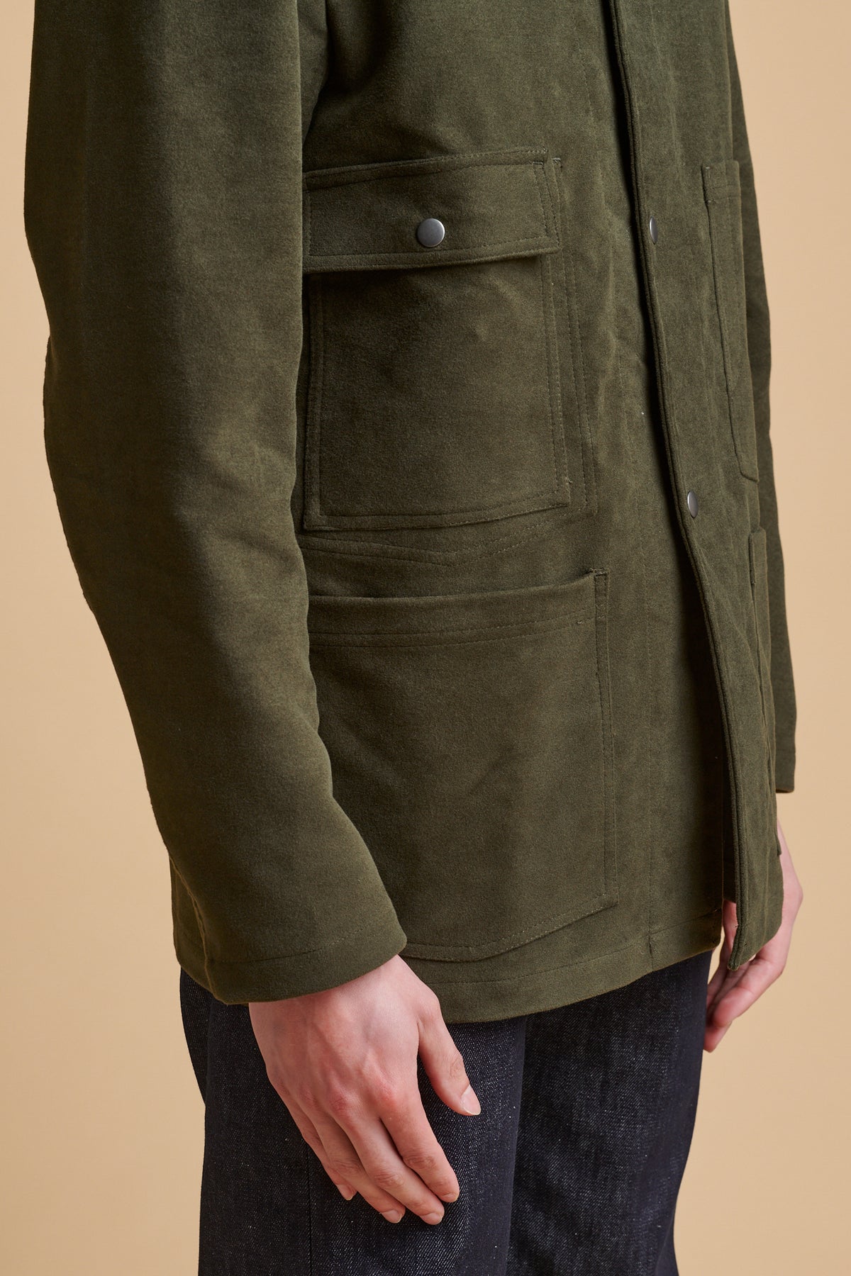 Details of front pockets on men's Carter moleskin chore jacket.