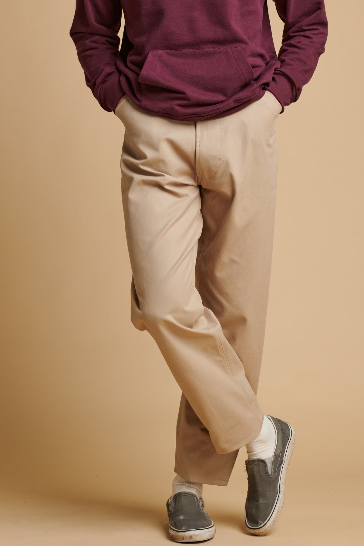 Male wearing chore heavyweight canvas trousers in putty.