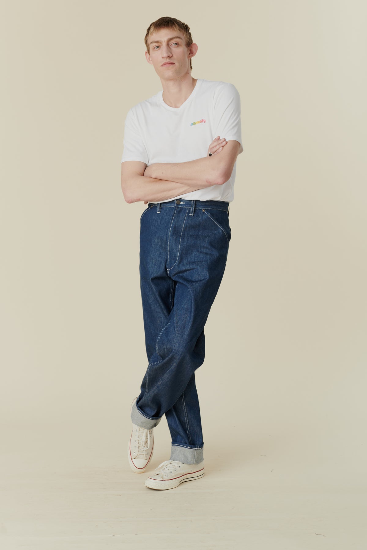Full body image of male in chore jean blue