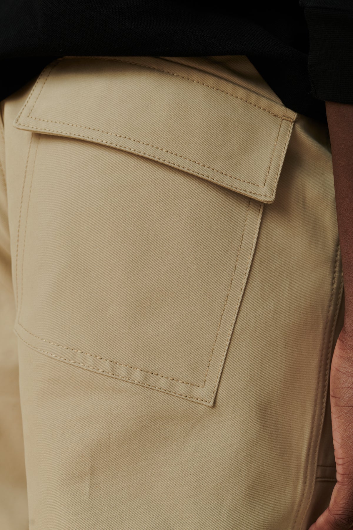 Back pocket detail of male wearing combat trouser in putty