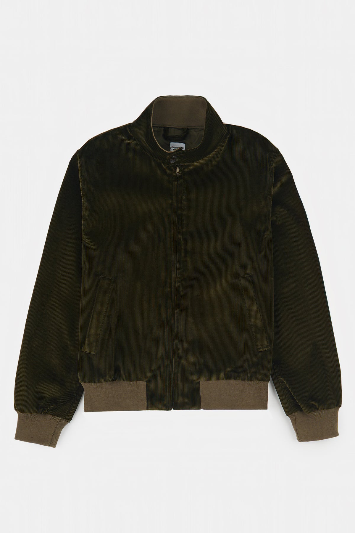 Flatlay product shot of men's corduroy Harrington in olive