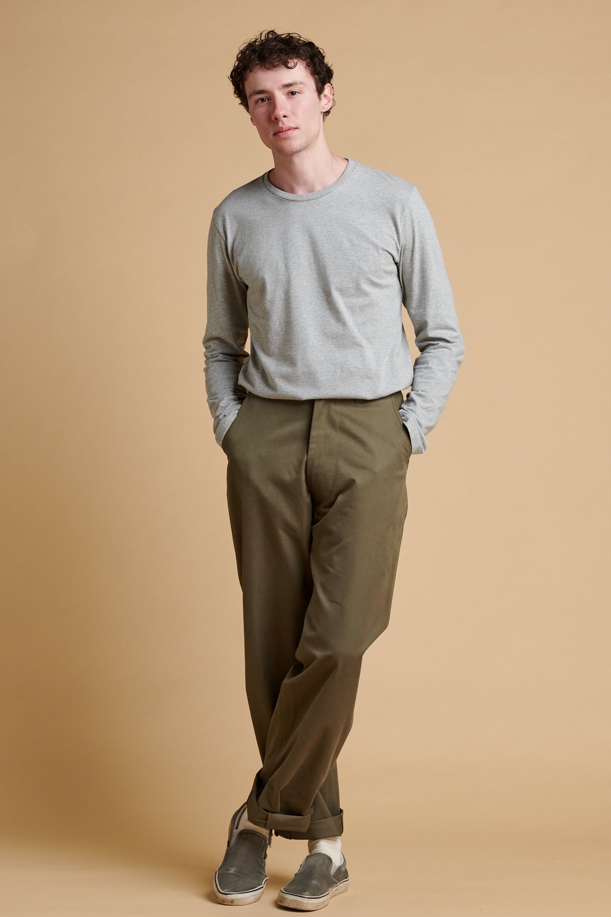 Male wearing field trousers in olive.