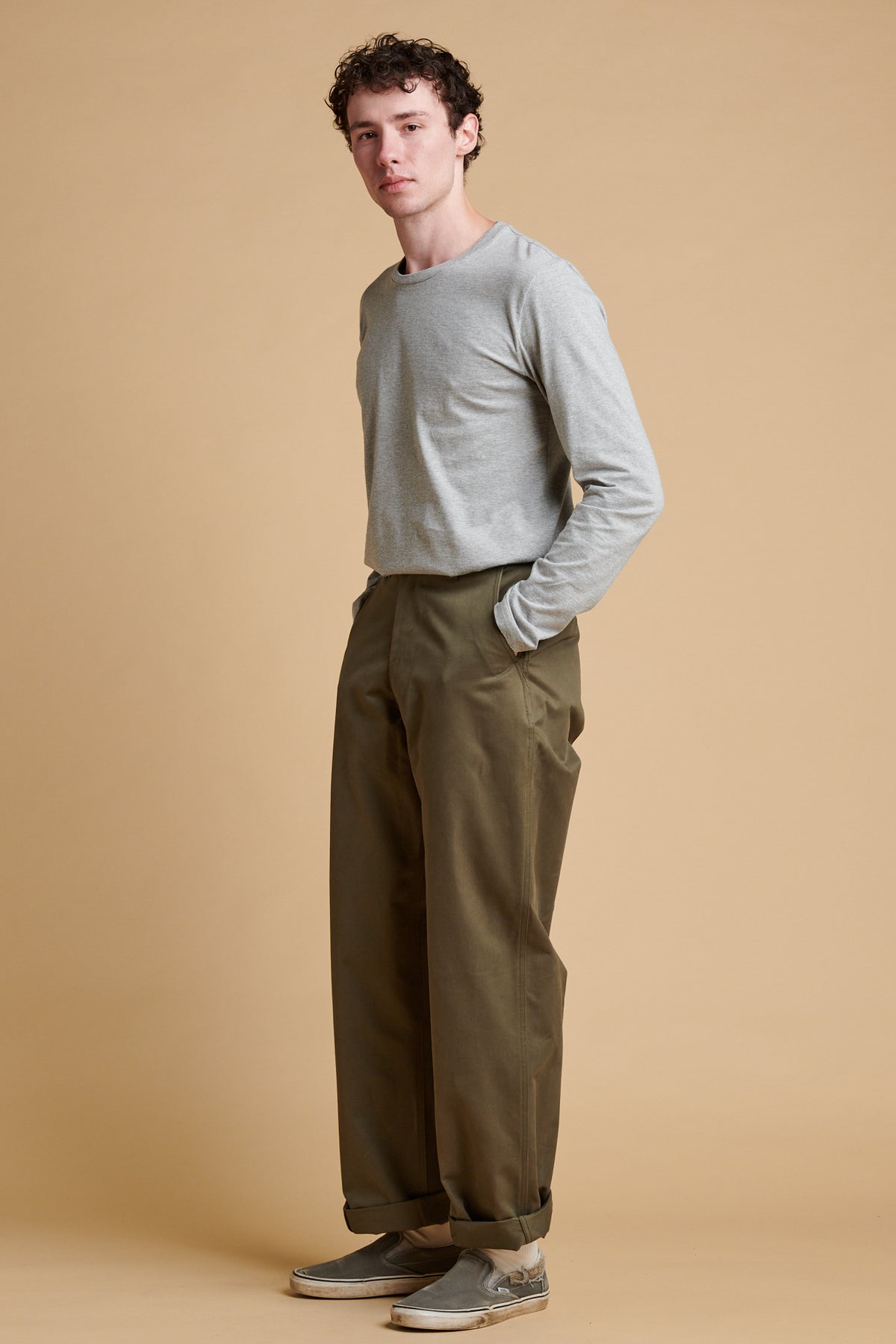 Male wearing field trousers in olive.