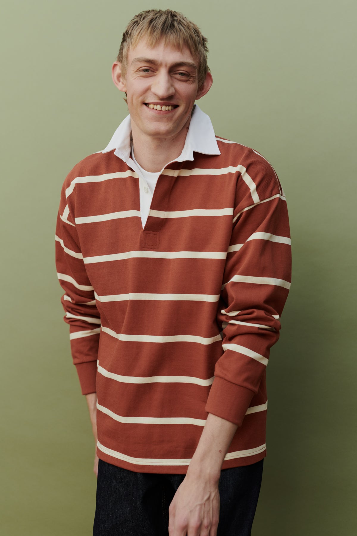 Male wearing rugby shirt in cinnamon and ecru