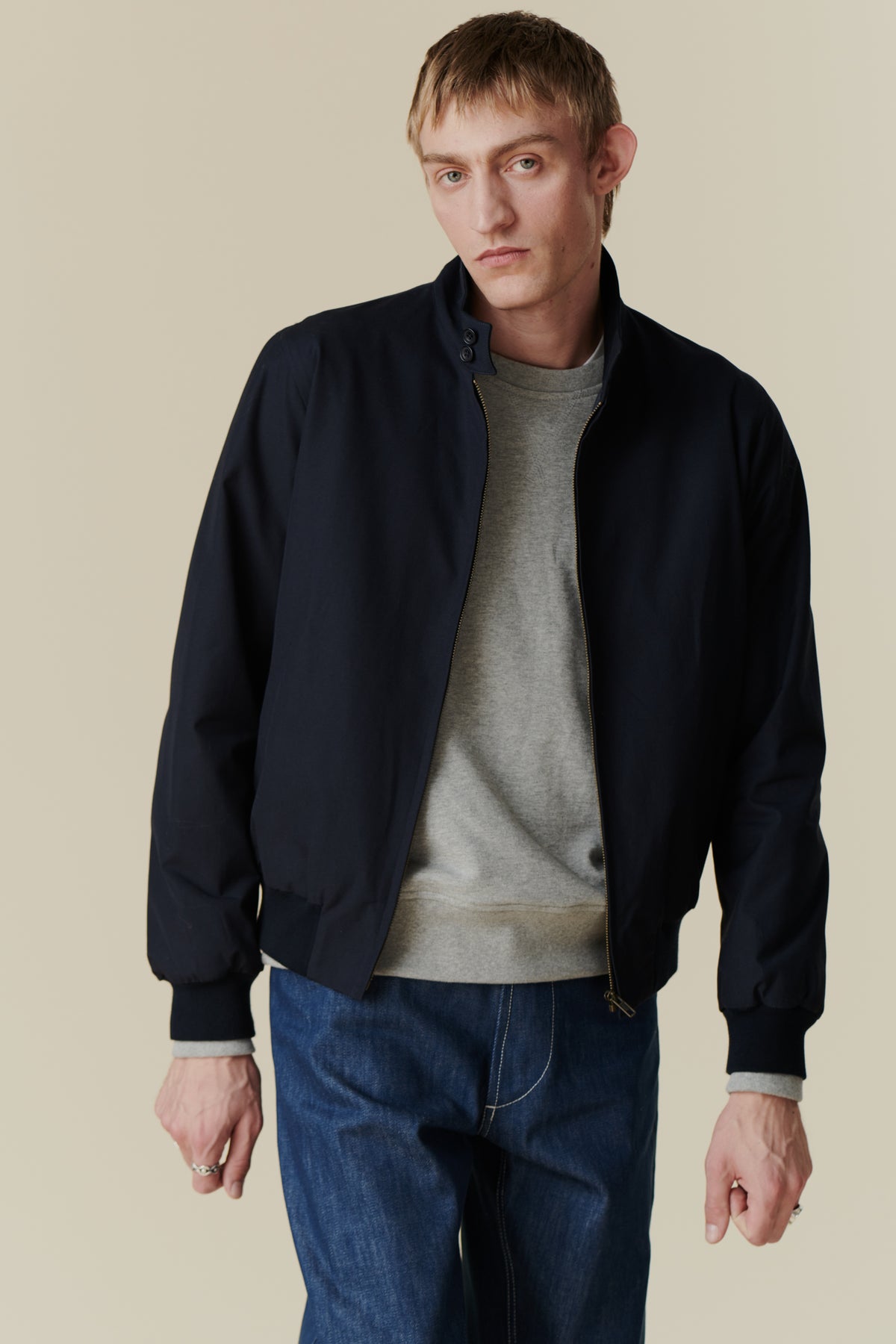 Male wearing Harrington jacket in navy