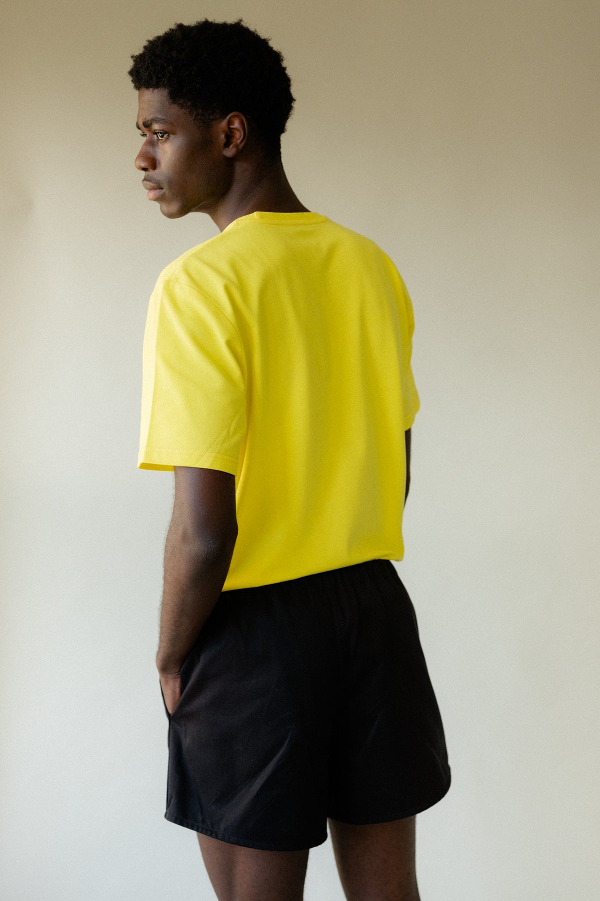 Image showing back of black male wearing heavyweight sports short plastic free in black