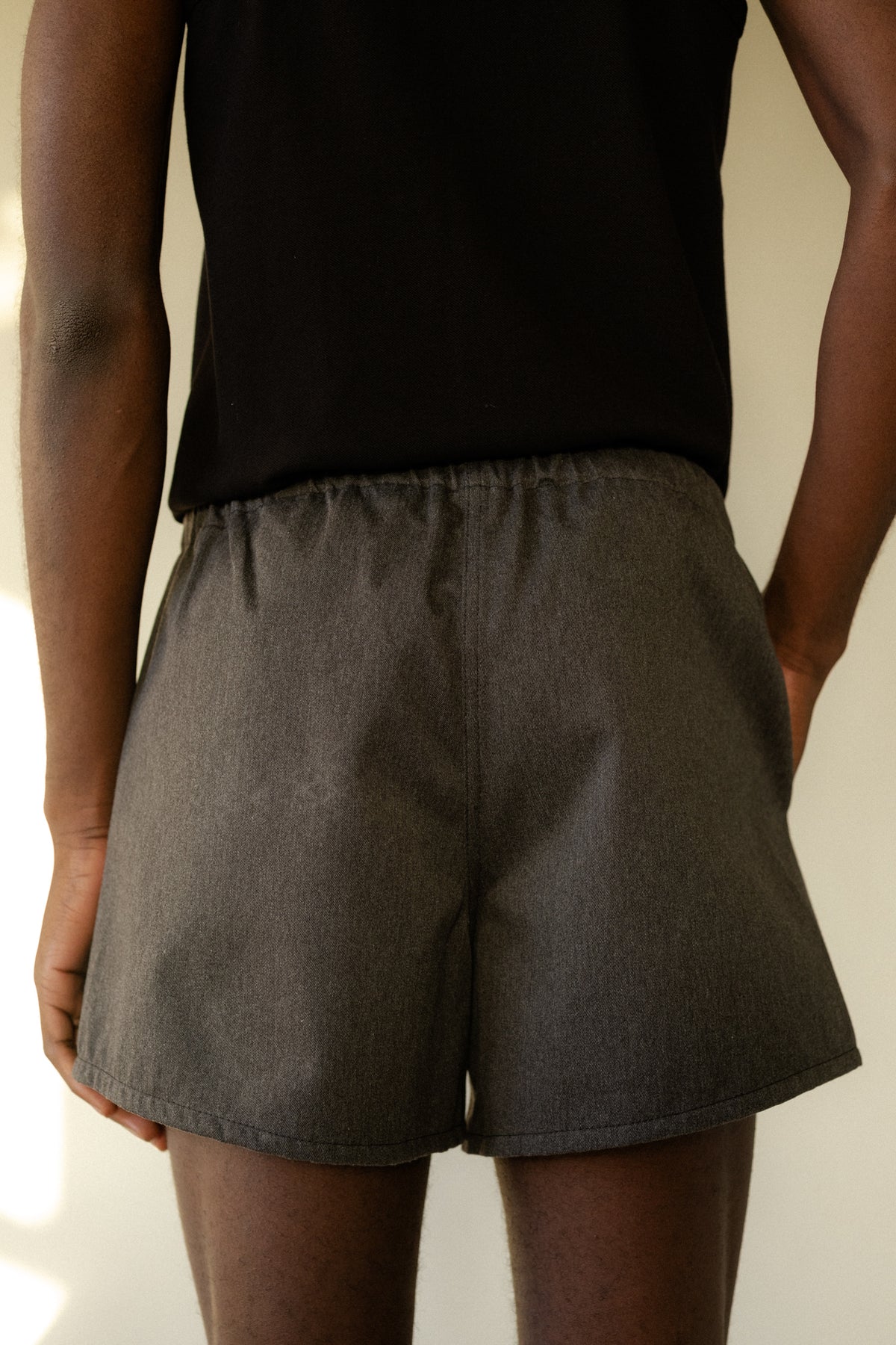 Back of male wearing men's heavyweight sports short plastic free in charcoal marl