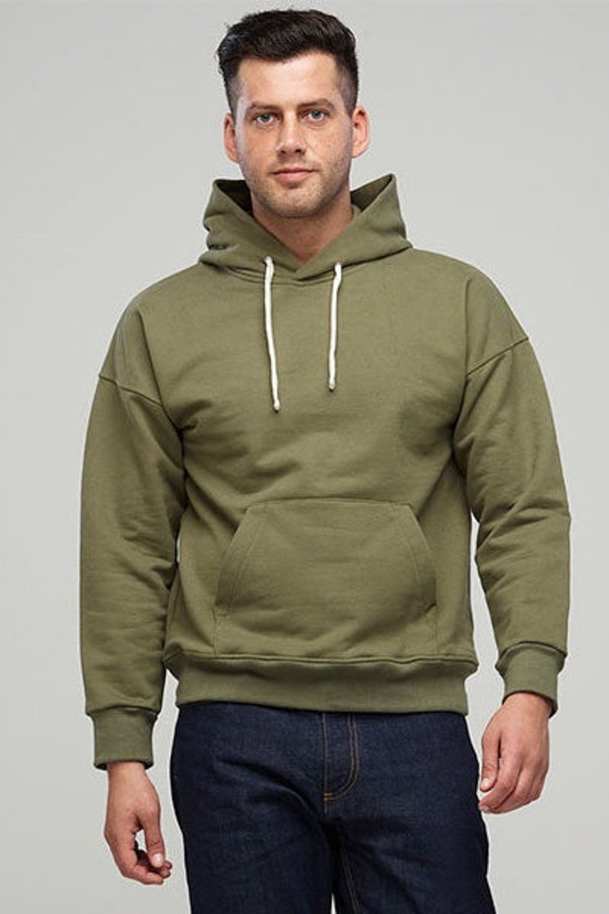 
            Male wearing olive green heritage hooded sweatshirt