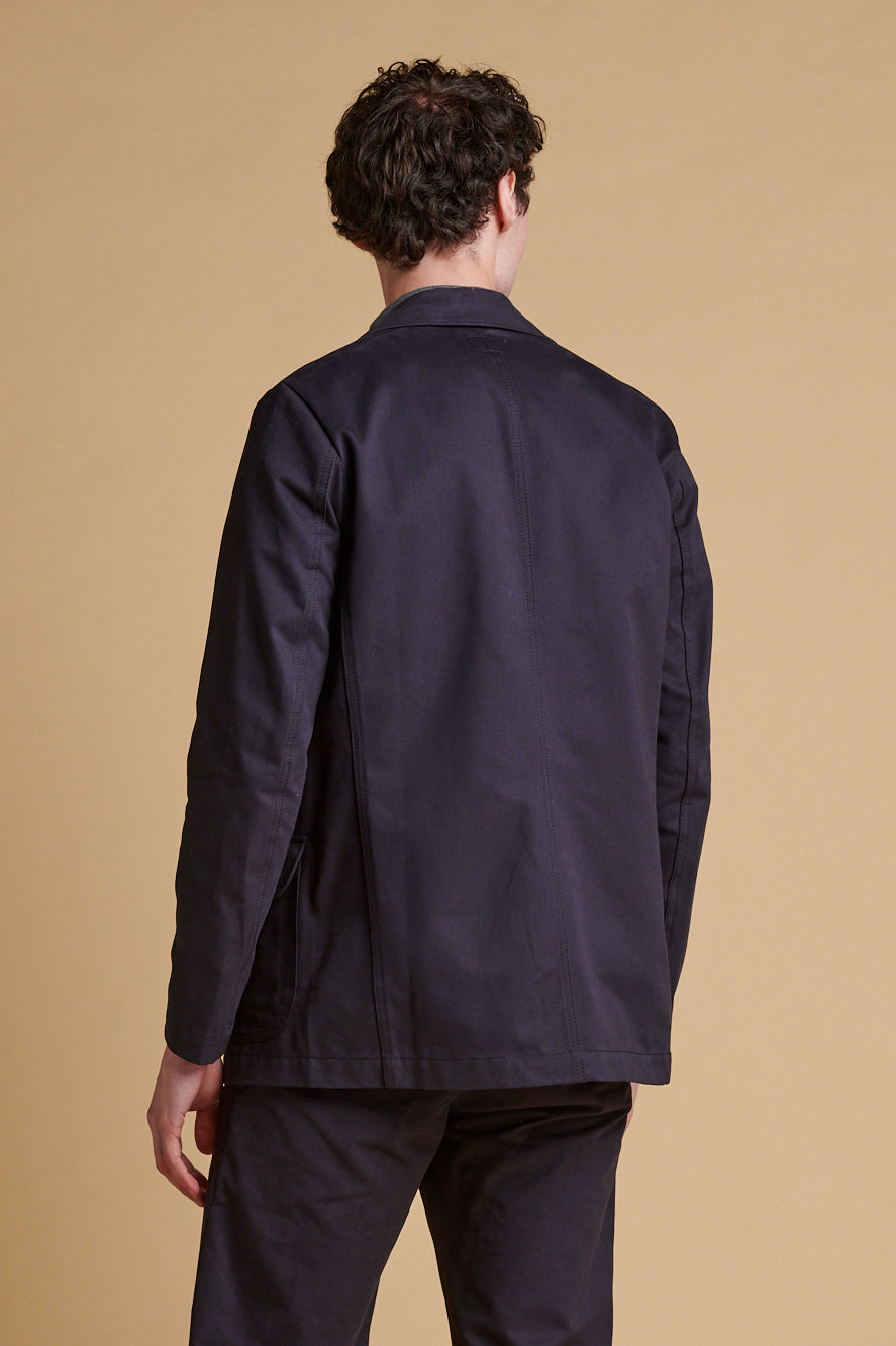 The back of male wearing dark navy James single breasted blazer.