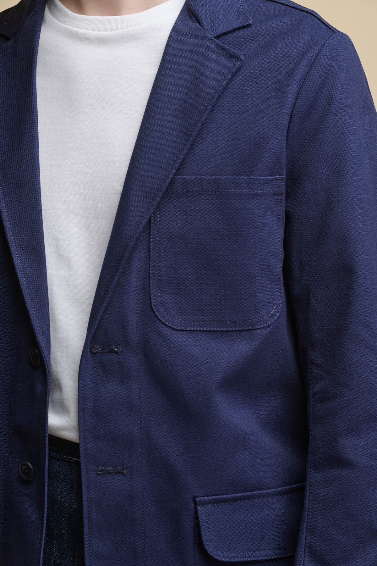 Close up detail image of Men's James Single Breasted Blazer in Navy with two front button fastenings and chest pocket