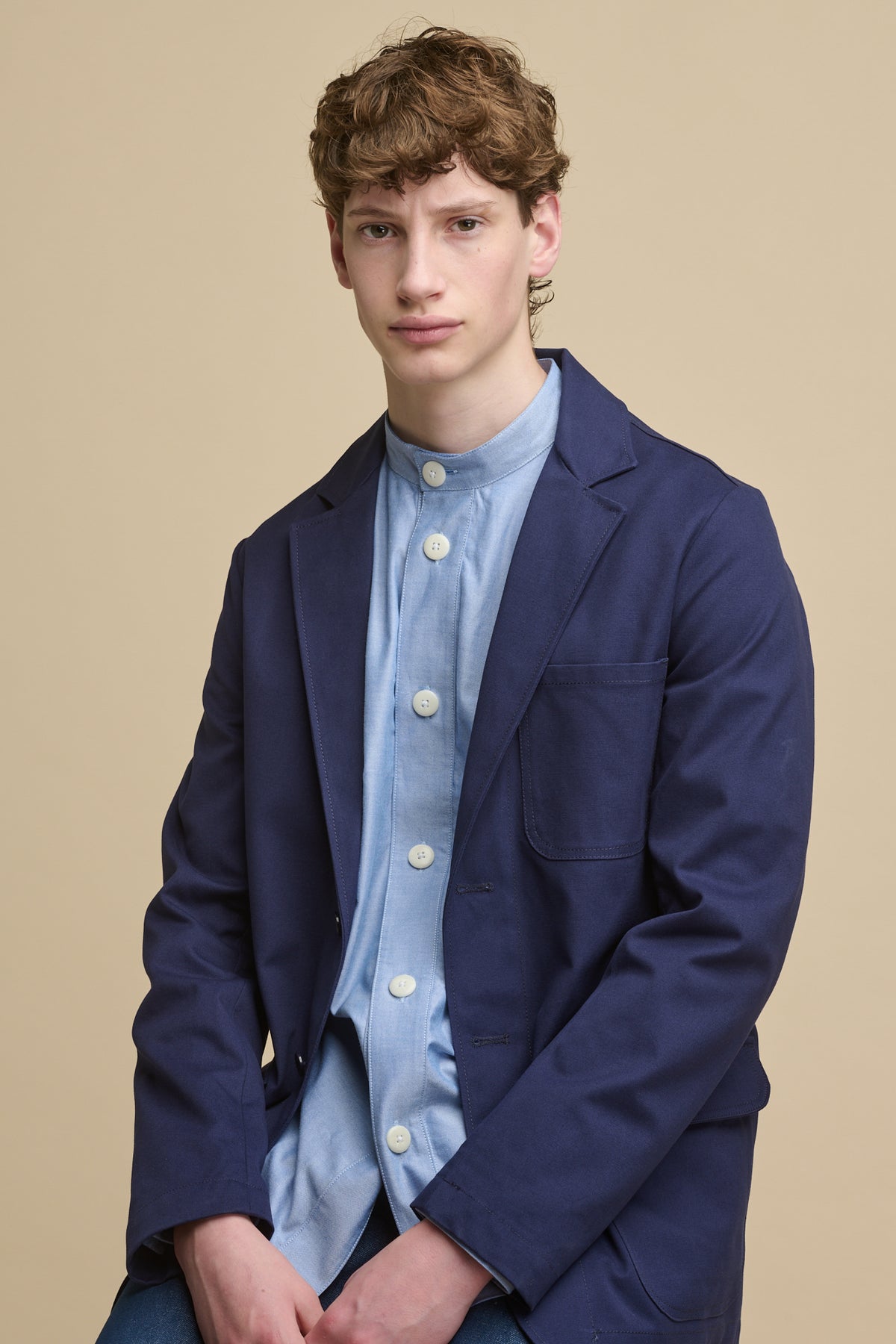 Male wearing Men's James Single Breasted Blazer in Navy, worn over Men's George Lightweight Collarless Overshirt